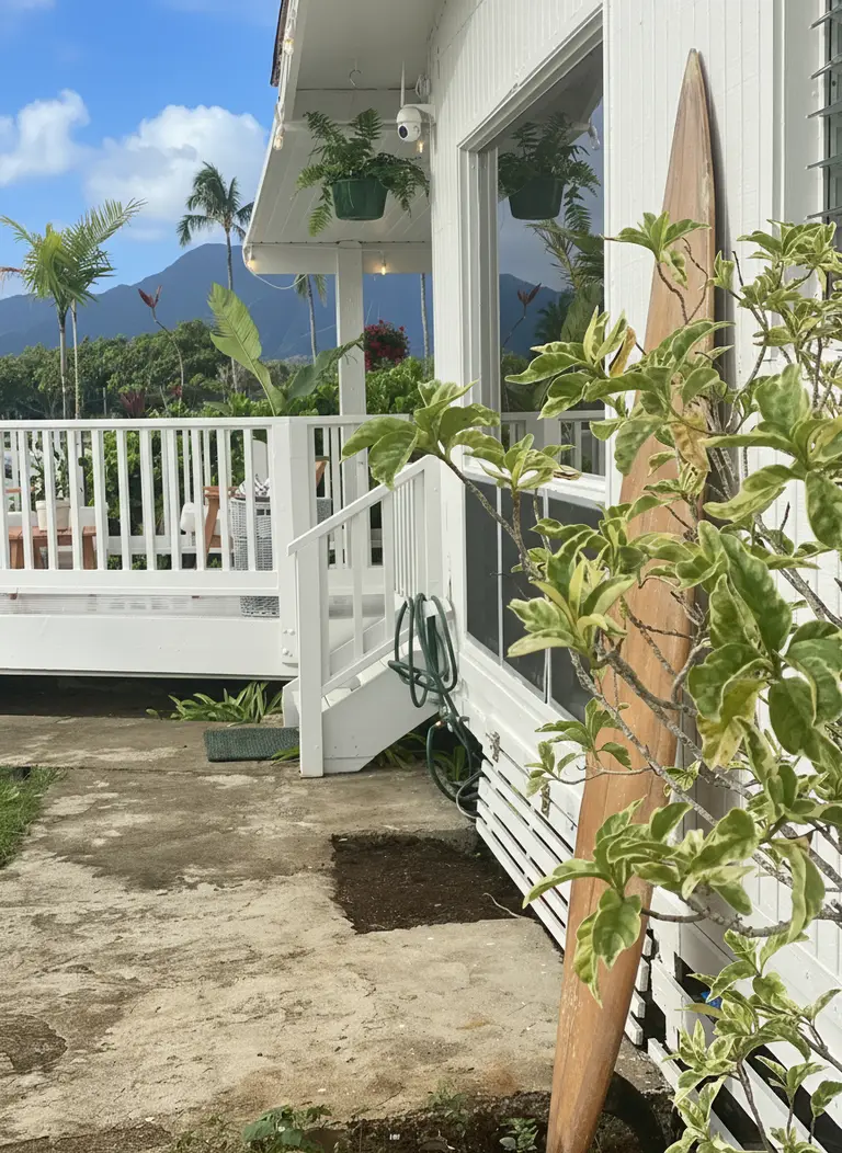 Beachfront Oahu vacation rental with sandy shoreline and clear water