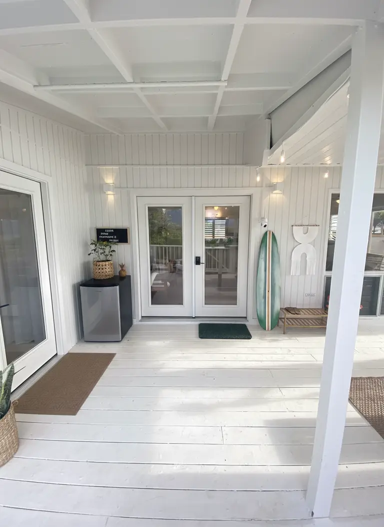 Oceanfront Oahu vacation rental exterior with direct beach access
